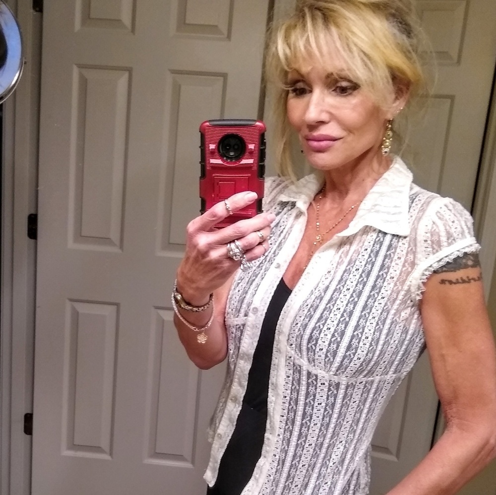 Short sleeve lace blouse. I have two of these .